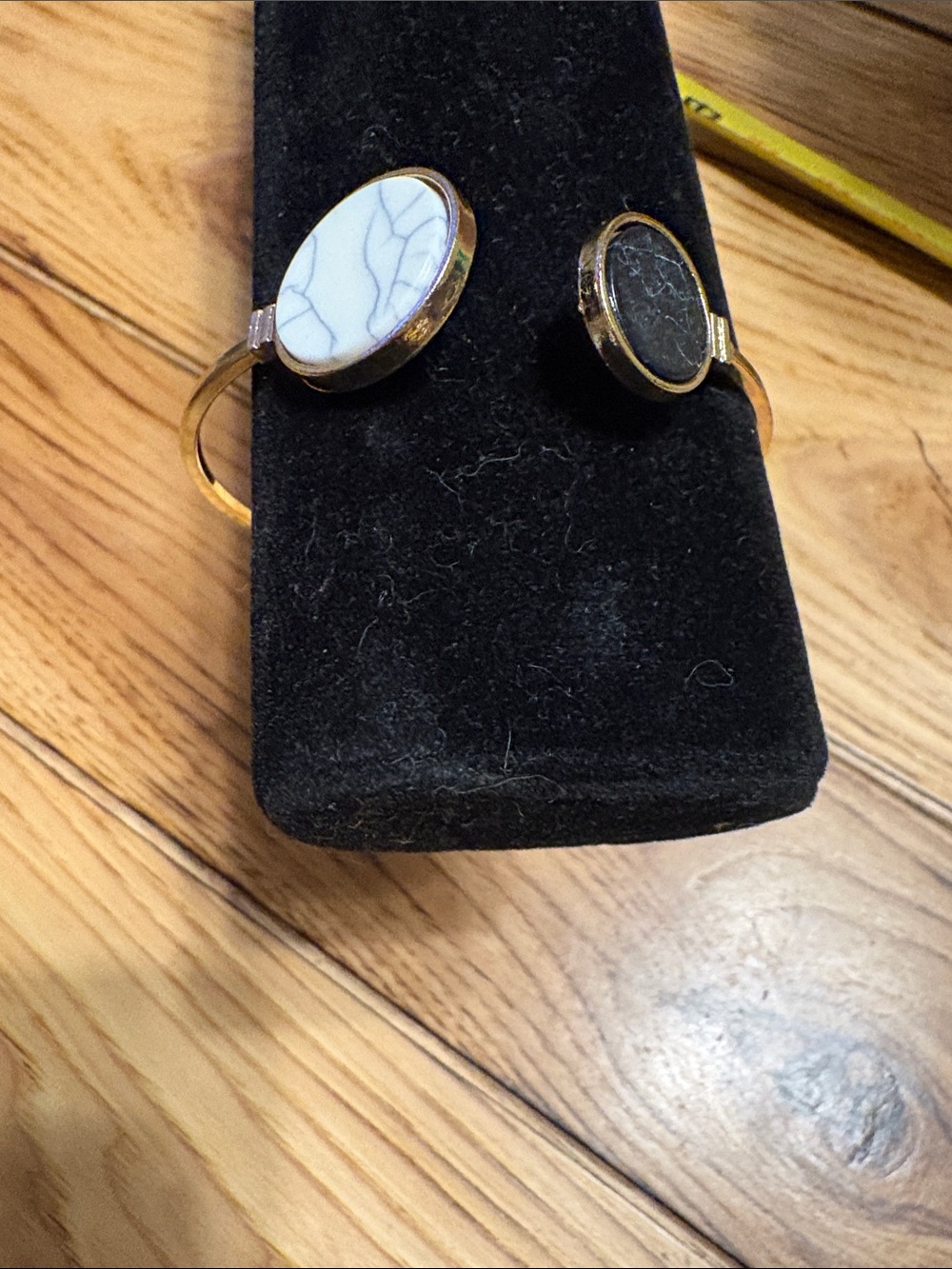 Gold-Tone Open Cuff Bracelet with White and Black Stone Discs